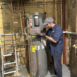 Hot Water Pros: Navigating the World of Water Heaters with Emergency P